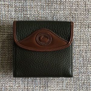 Dooney & Bourke green flap closure wallet.